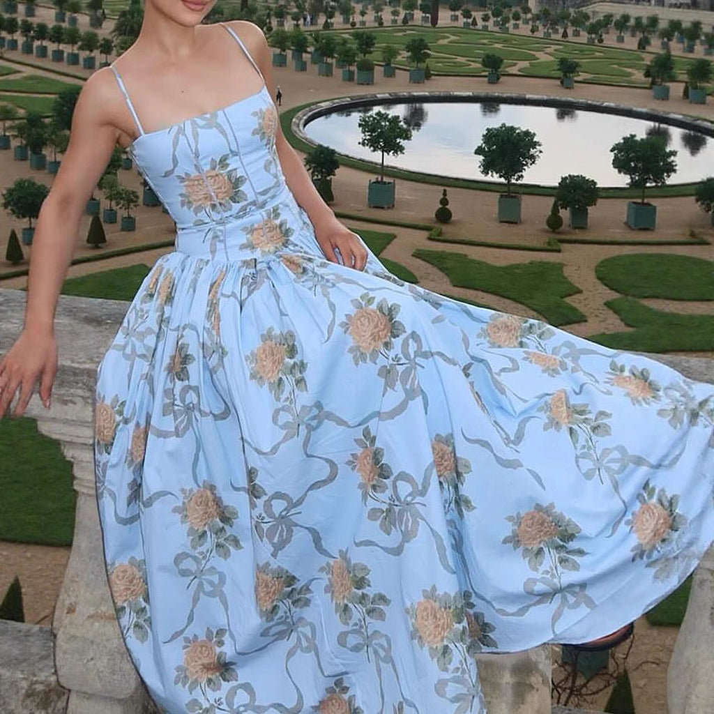 The Breezy Getaway Maxi: Printed Open-Back Silhouette for Seaside Evenings